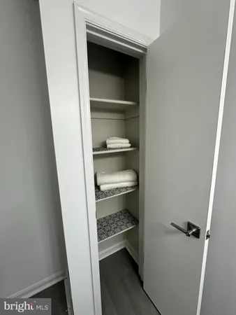 a view of a room with rack on the wall