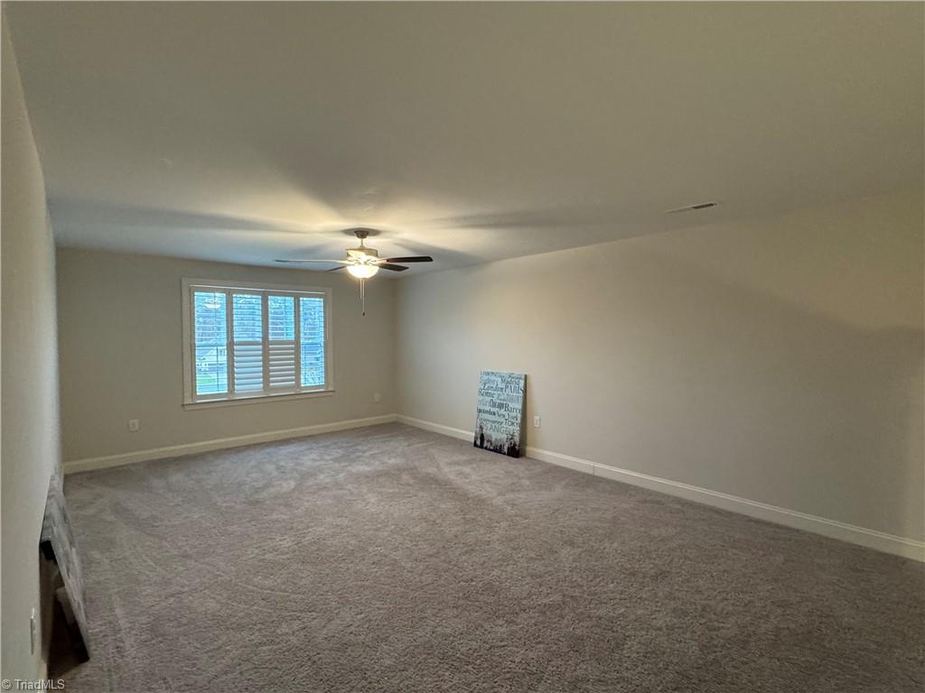 3924 Braddock Road High Point, NC 27265 - Photo 21 of 26 Bonus family room cleared out and ready for your furniture!