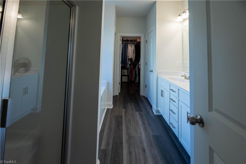 3924 Braddock Road High Point, NC 27265 - Photo 10 of 26 4 piece bathroom has separate soaker tub and shower, dual vanity sinks, and huge walk in closet.