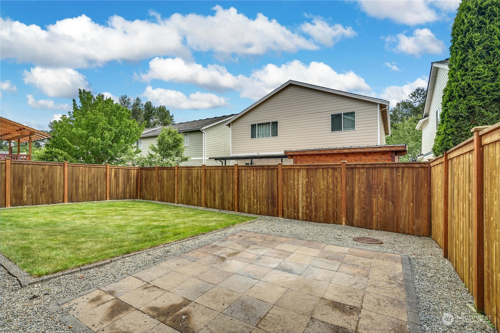 23729 17th Place West Bothell, WA 98021 - Photo 29 of 34 a view of a backyard with wooden fence