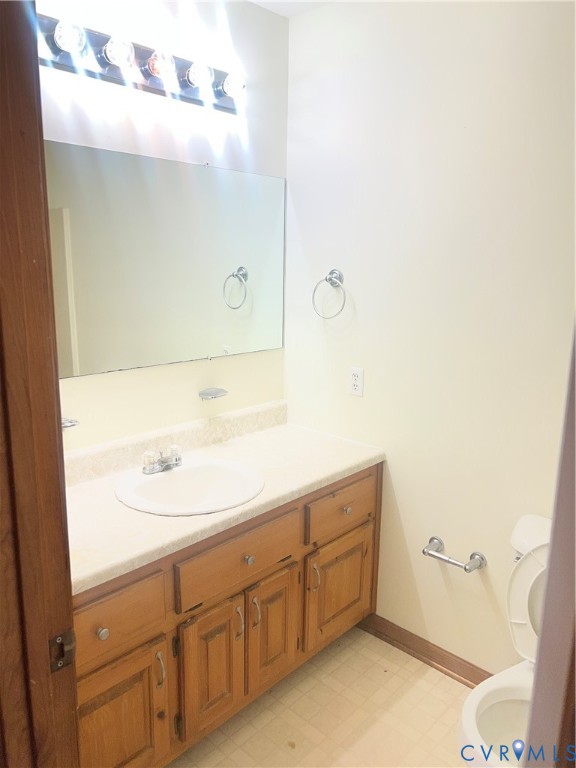11449 Cedar Run Road Petersburg, VA 23805 - Photo 12 of 19 a bathroom with a sink and a mirror