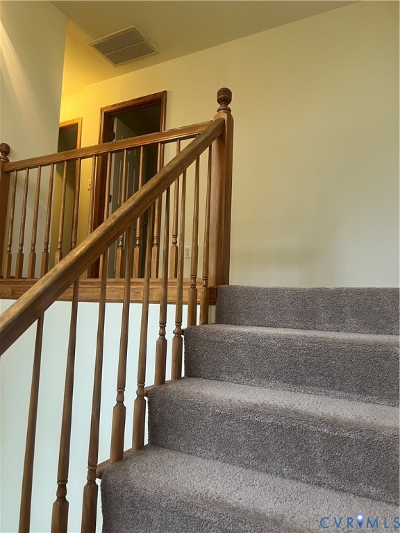 11449 Cedar Run Road Petersburg, VA 23805 - Photo 14 of 19 a view of staircase with lots of wooden floor and a window