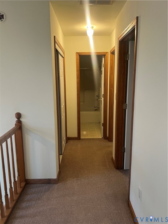 11449 Cedar Run Road Petersburg, VA 23805 - Photo 15 of 19 a view of a hallway with wooden shelves
