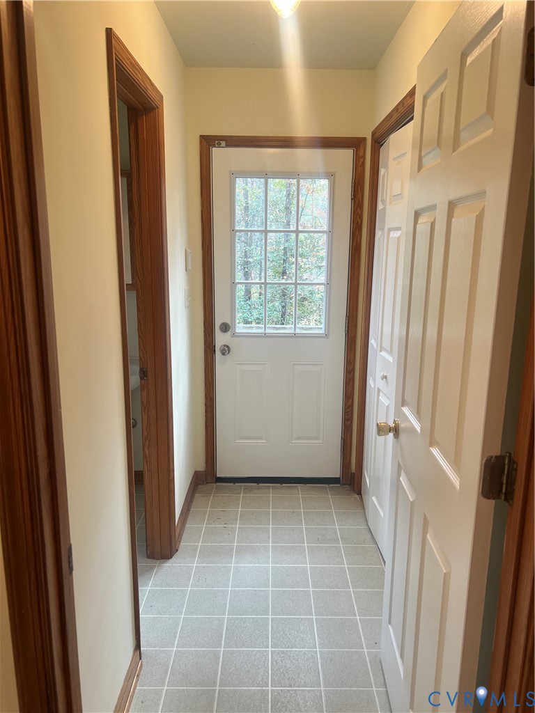 11449 Cedar Run Road Petersburg, VA 23805 - Photo 6 of 19 a view of an empty room with a window