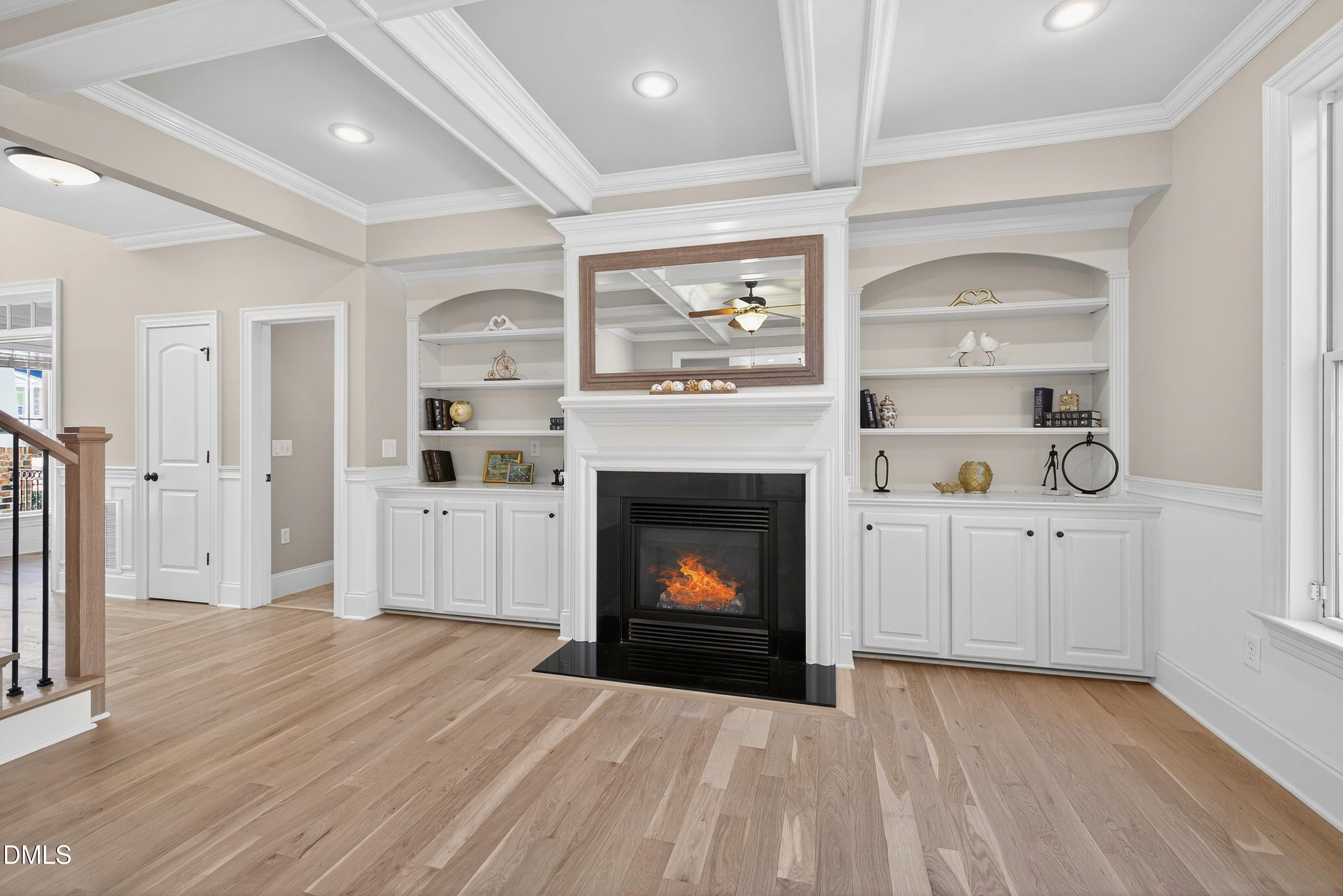 307 Ashdown Forest Lane Cary, NC 27519 - Photo 16 of 91 a view of a livingroom with an empty space and a fireplace
