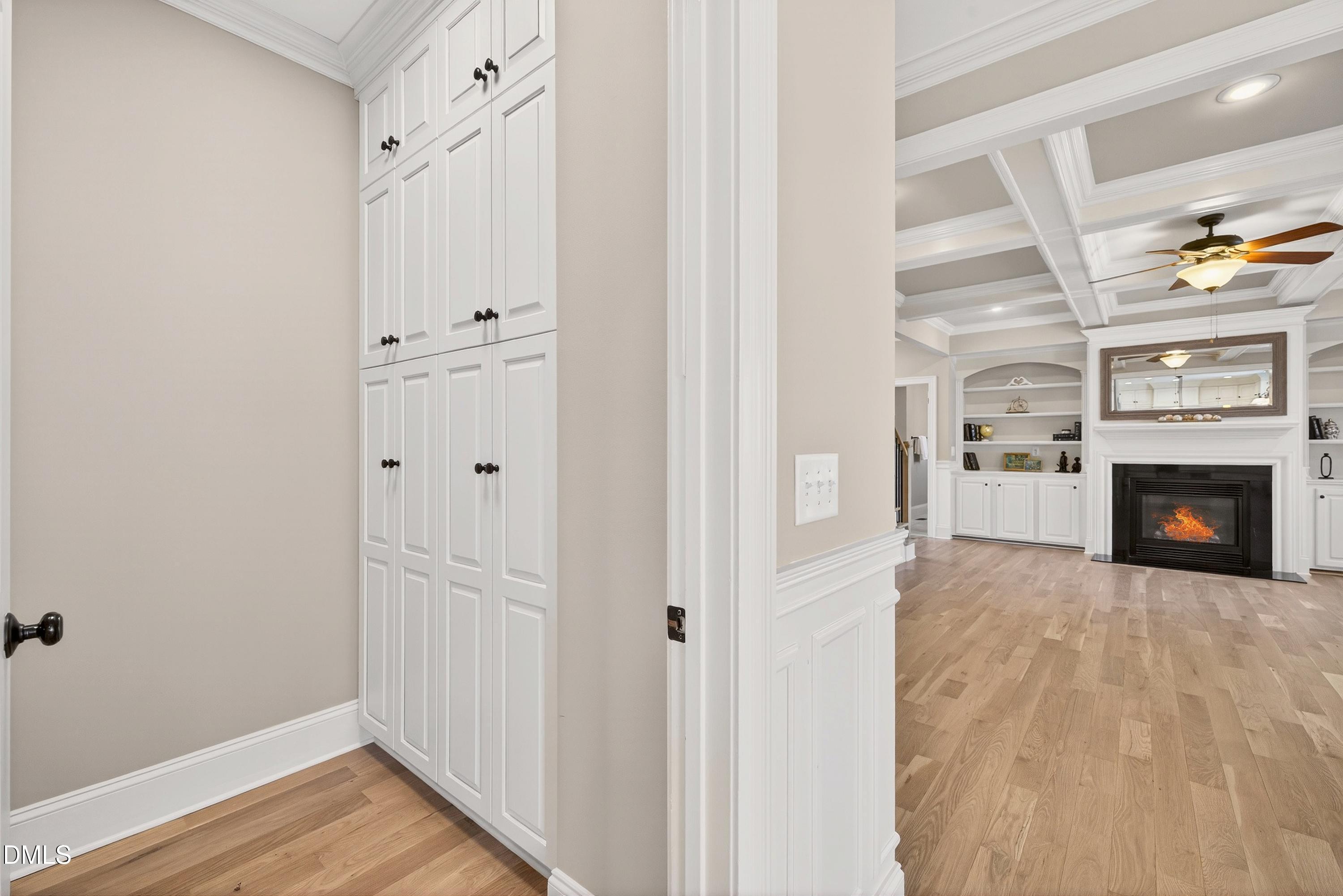 307 Ashdown Forest Lane Cary, NC 27519 - Photo 26 of 91 a view of a livingroom with wooden floor and a fireplace