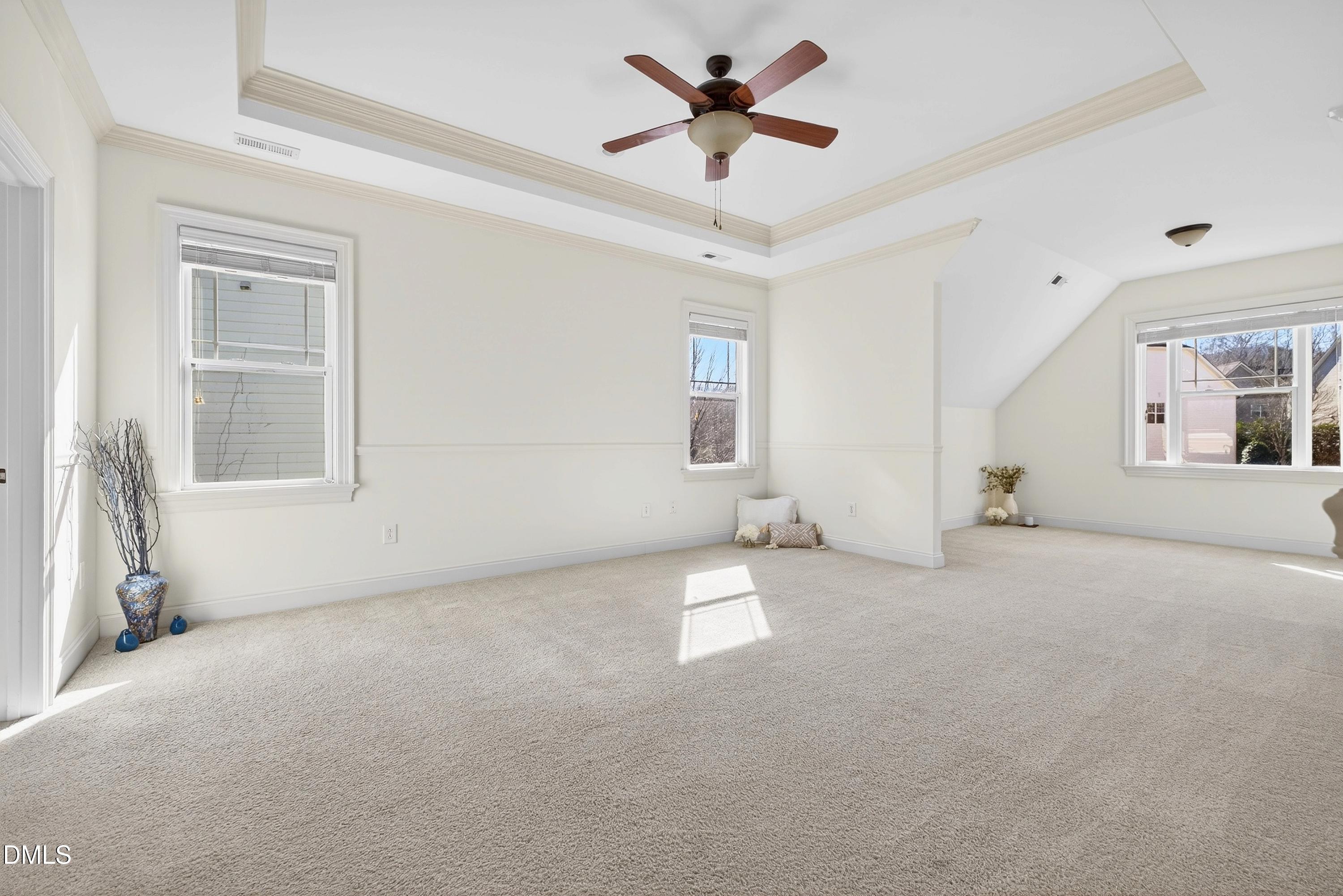 307 Ashdown Forest Lane Cary, NC 27519 - Photo 30 of 91 a view of a livingroom with a ceiling fan and window