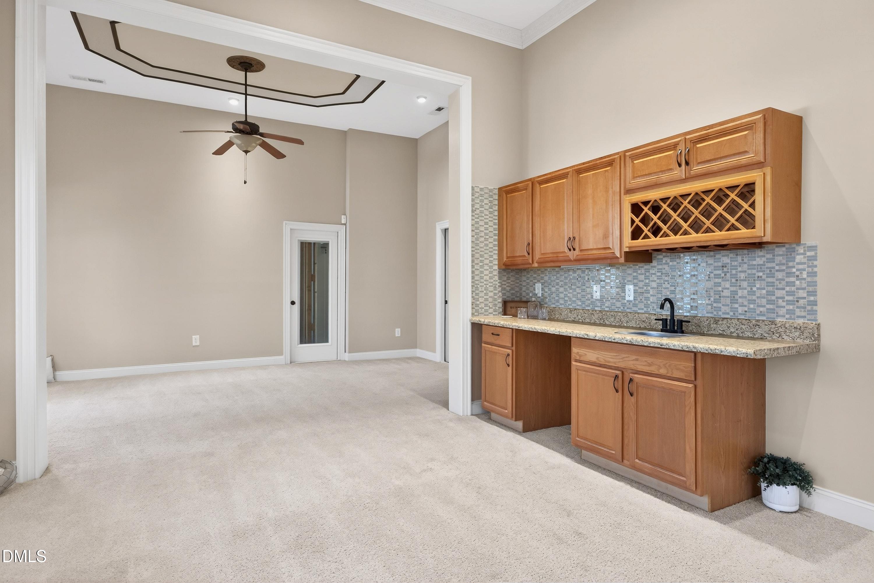 307 Ashdown Forest Lane Cary, NC 27519 - Photo 59 of 91 a view of a kitchen cabinets stainless steel appliances a sink and a counter top space