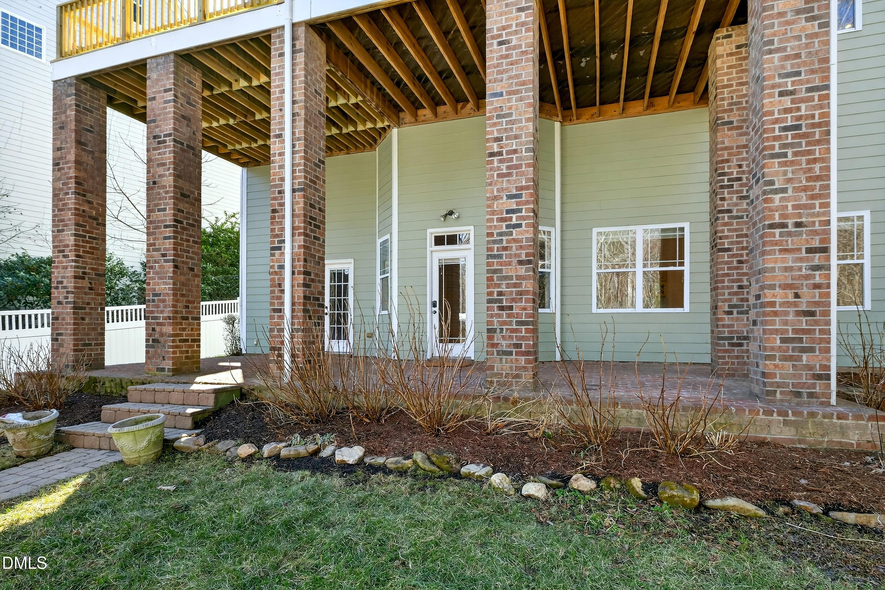 307 Ashdown Forest Lane Cary, NC 27519 - Photo 67 of 91 a front view of a house with a yard