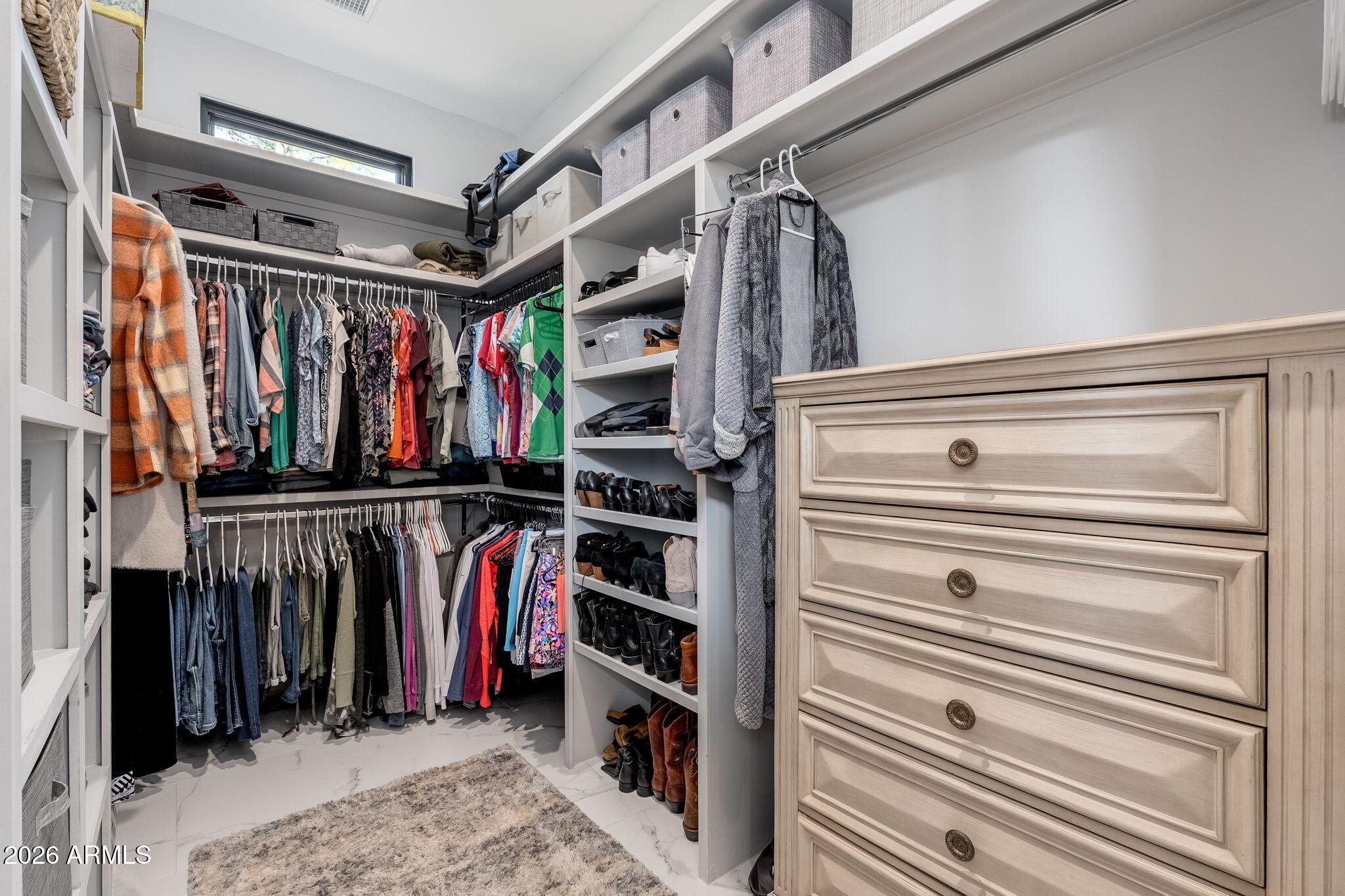 602 North Redbud Circle Payson, AZ 85541 - Photo 30 of 83 a view of walk in closet with clothes and shoes