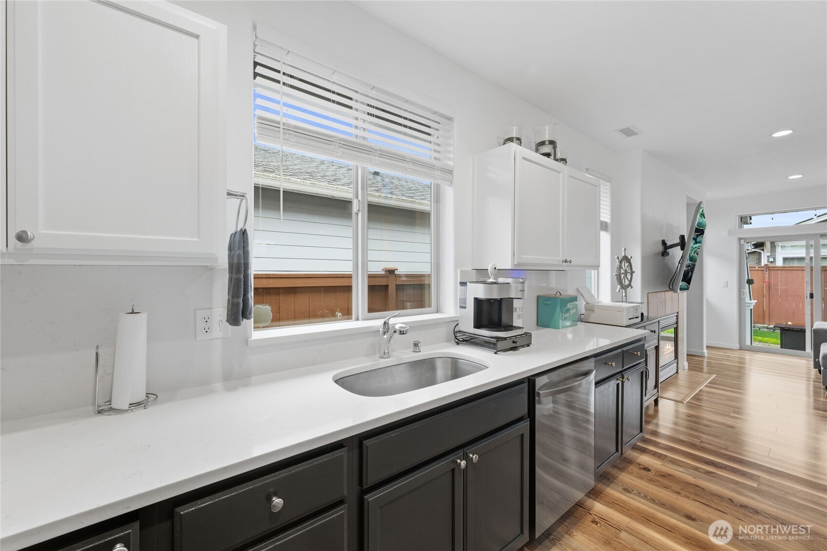 8218 Bainbridge Loop Northeast Lacey, WA 98516 - Photo 13 of 40 a kitchen with a sink and a window