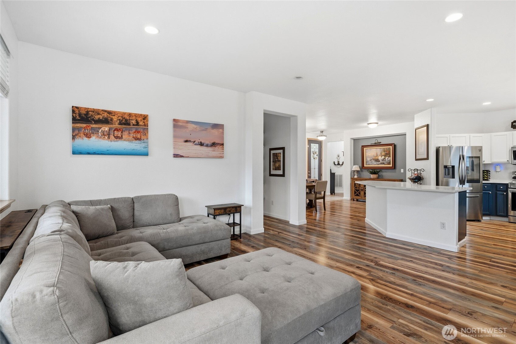 8218 Bainbridge Loop Northeast Lacey, WA 98516 - Photo 21 of 40 a living room with furniture and kitchen view