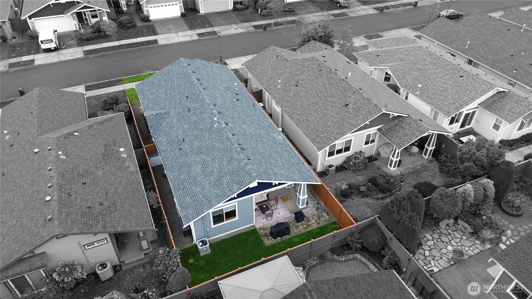 8218 Bainbridge Loop Northeast Lacey, WA 98516 - Photo 30 of 40 an aerial view of a residential apartment building with a yard
