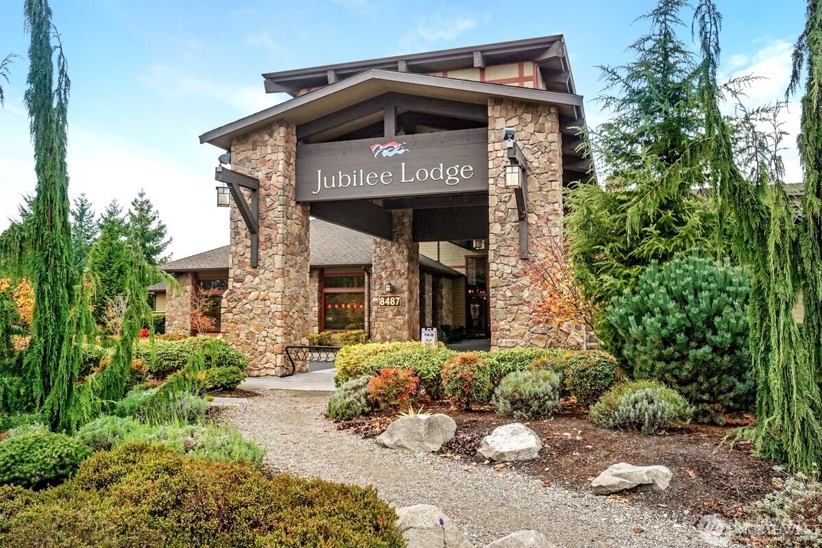 8218 Bainbridge Loop Northeast Lacey, WA 98516 - Photo 33 of 40 a front view of a house with a yard