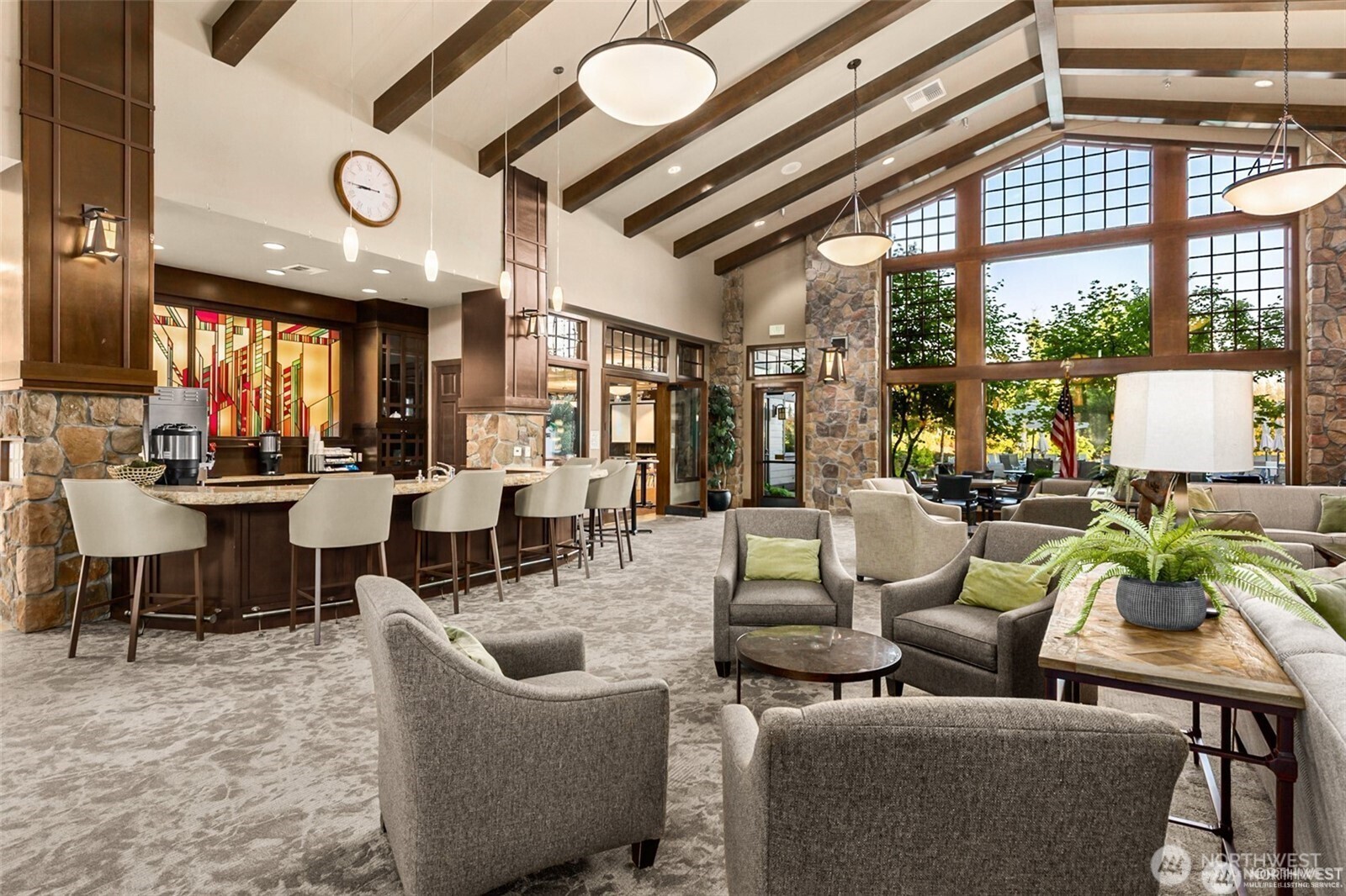 8218 Bainbridge Loop Northeast Lacey, WA 98516 - Photo 35 of 40 a living room with lots of furniture and a large window