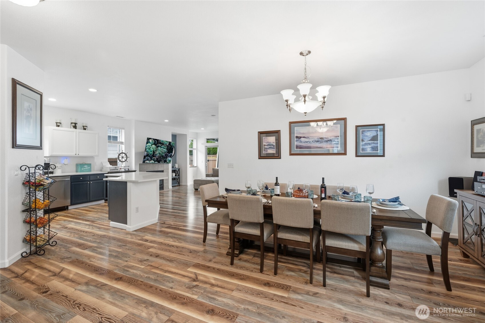 8218 Bainbridge Loop Northeast Lacey, WA 98516 - Photo 6 of 40 a view of a dining room with furniture window and wooden floor