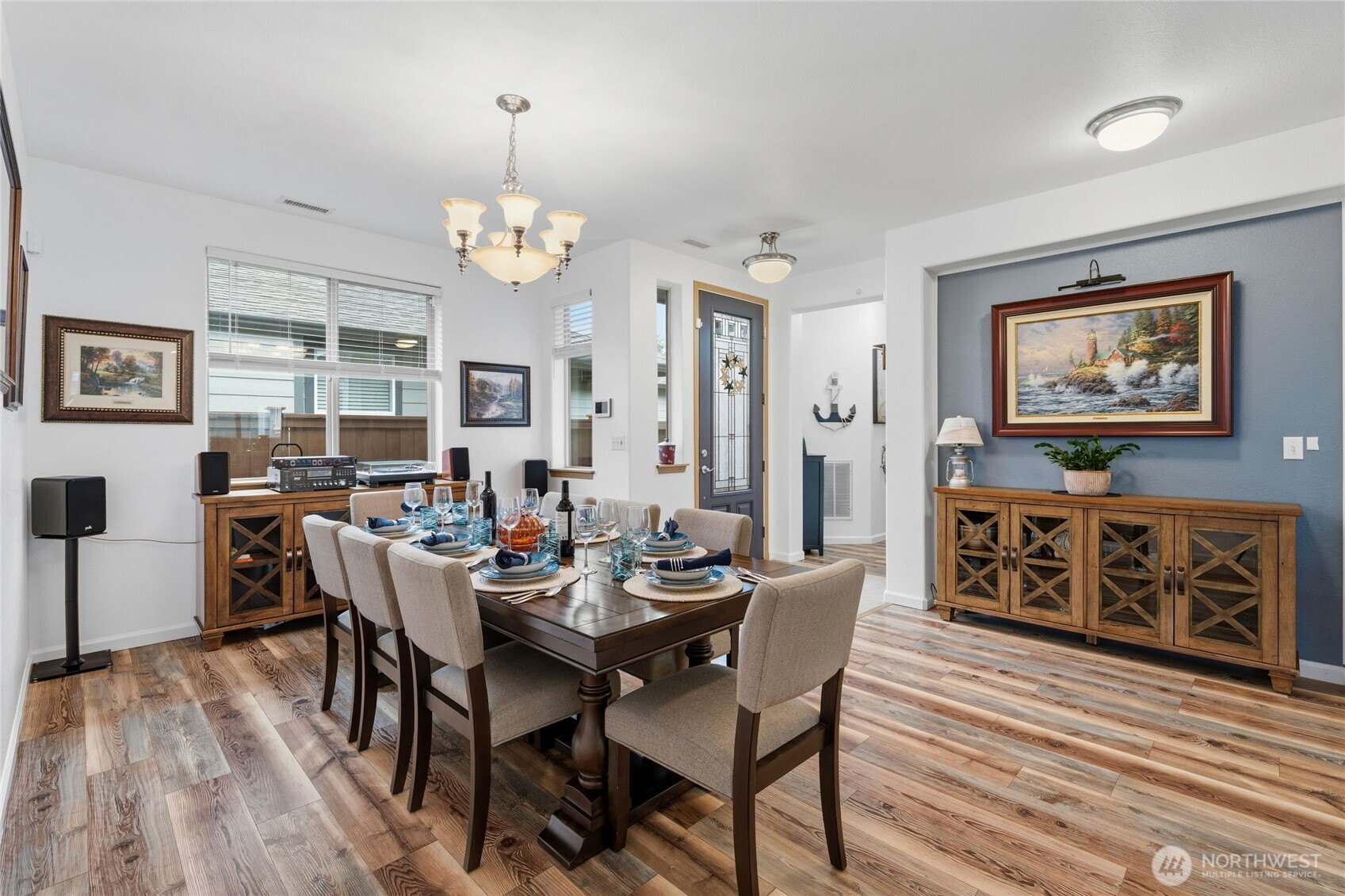 8218 Bainbridge Loop Northeast Lacey, WA 98516 - Photo 9 of 40 a view of a dining room with furniture window and wooden floor