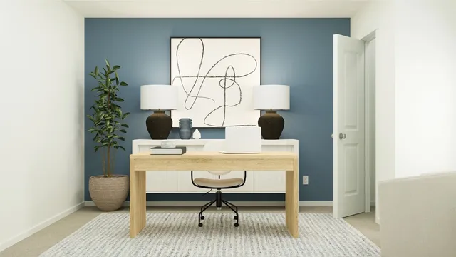 a view of a workspace with furniture and wooden floor