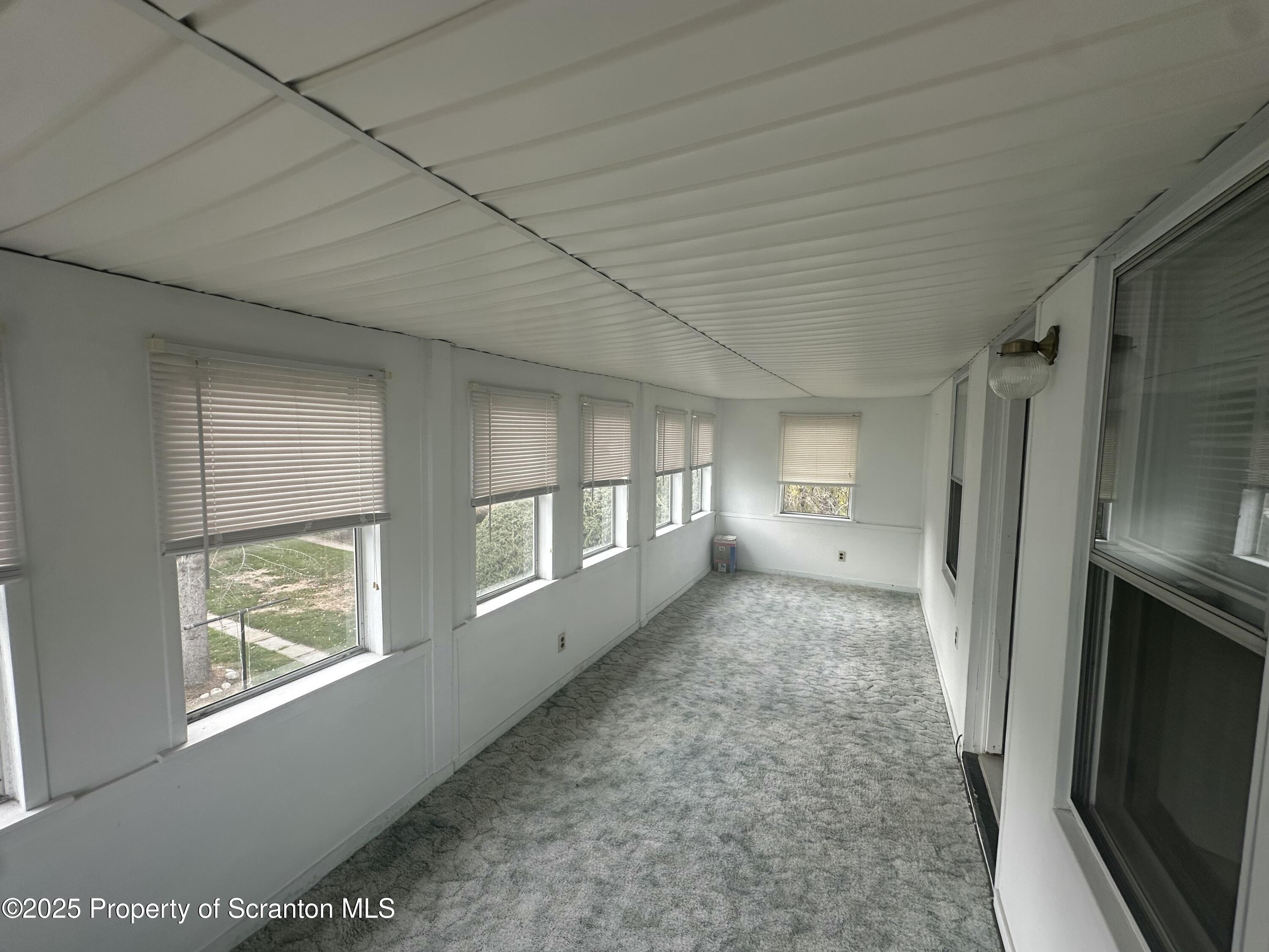 1906 Farr Street, Unit 2 Scranton, PA 18504 - Photo 12 of 14 a view of empty room with windows