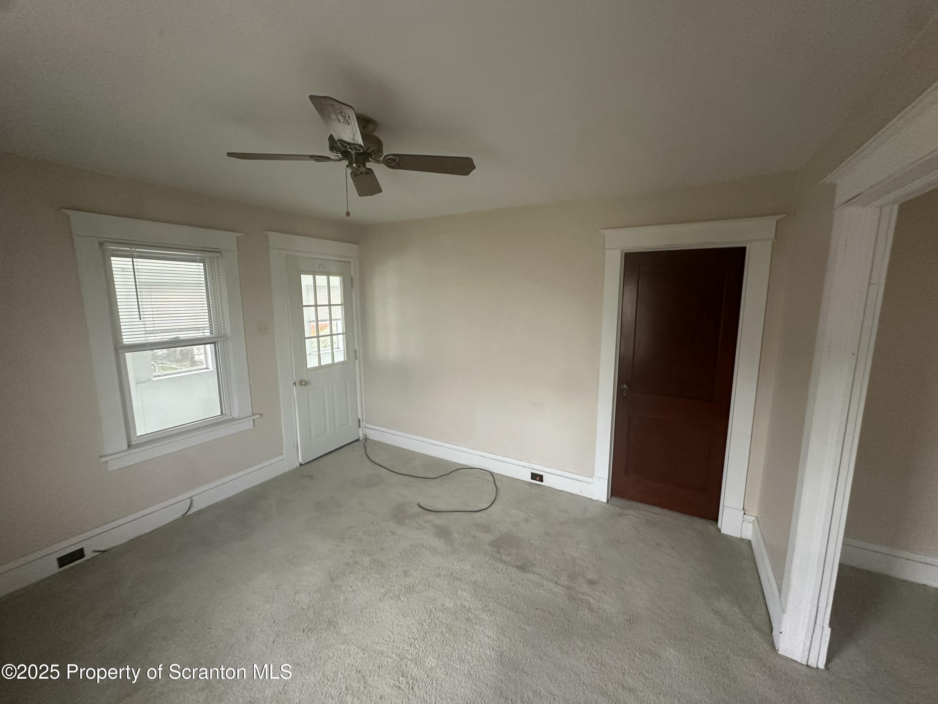 1906 Farr Street, Unit 2 Scranton, PA 18504 - Photo 5 of 14 an empty room with windows and closet