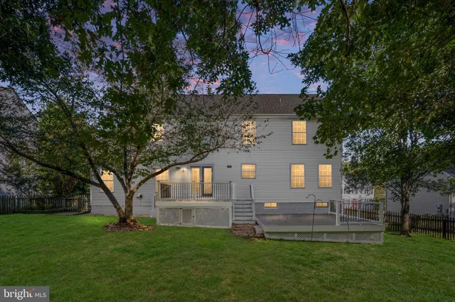 a view of house with a garden