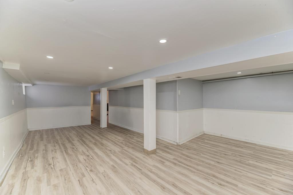 1472 West 74th Street Chicago, IL 60636 - Photo 27 of 32 a view of empty room with wooden floor