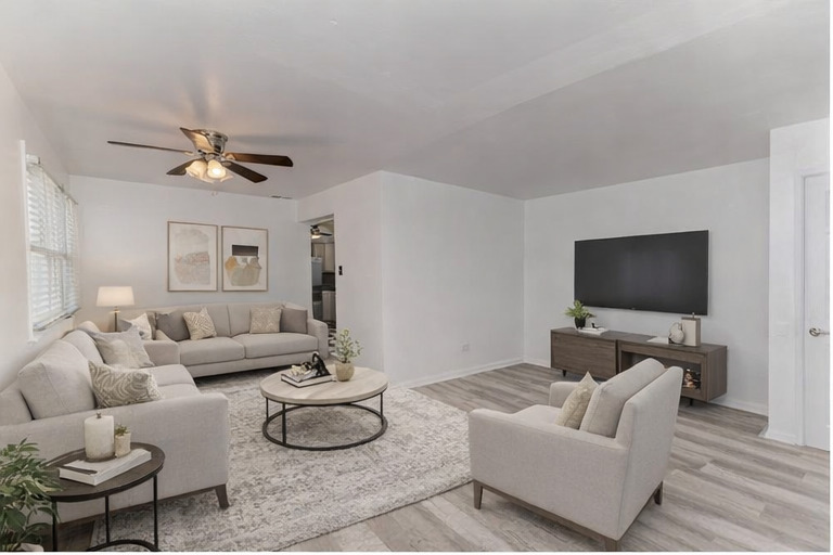 1472 West 74th Street Chicago, IL 60636 - Photo 6 of 32 a living room with furniture and a flat screen tv