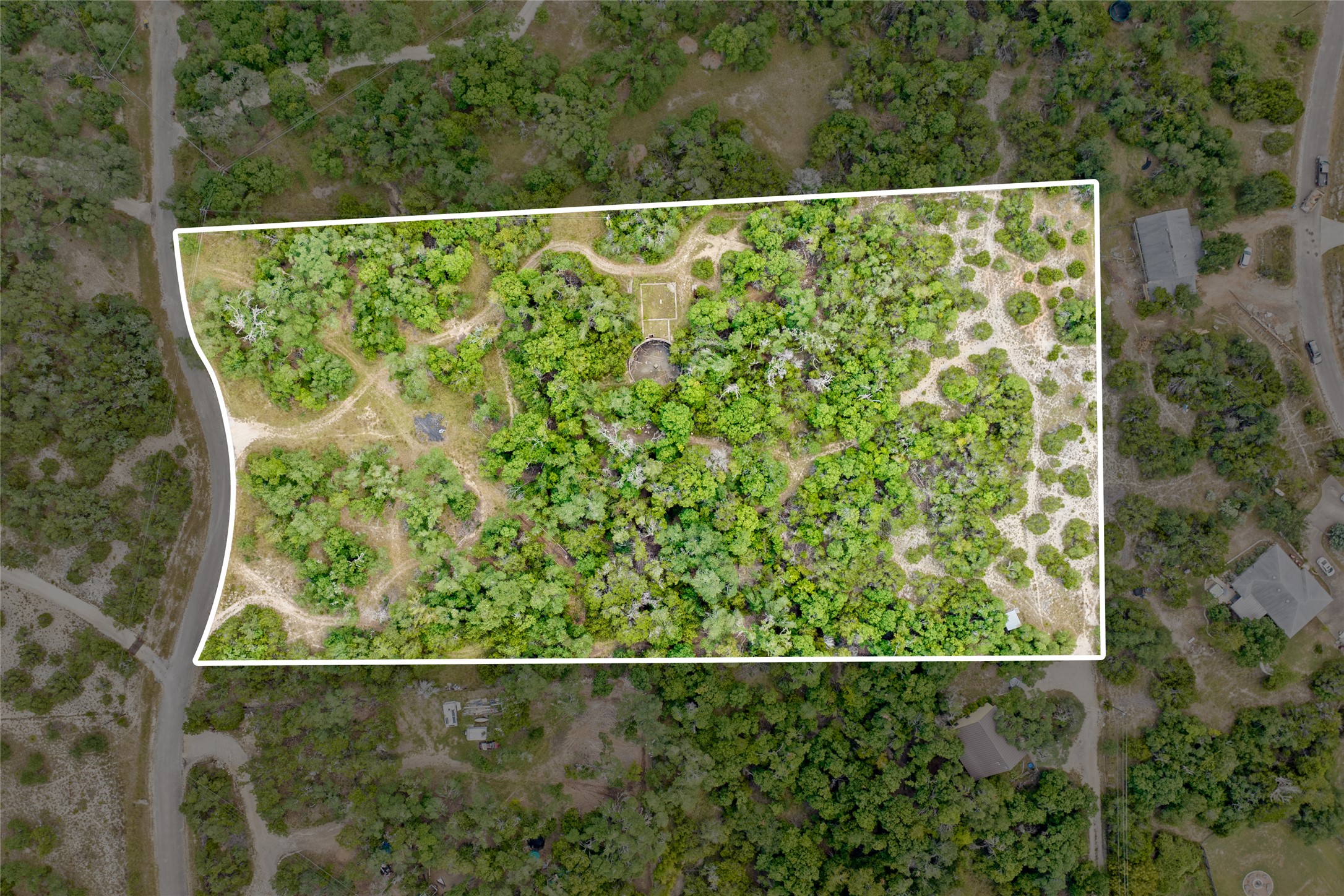 150 Oak Grove Drive Dripping Springs, TX 78620 - Photo 16 of 33 a view of a small yard