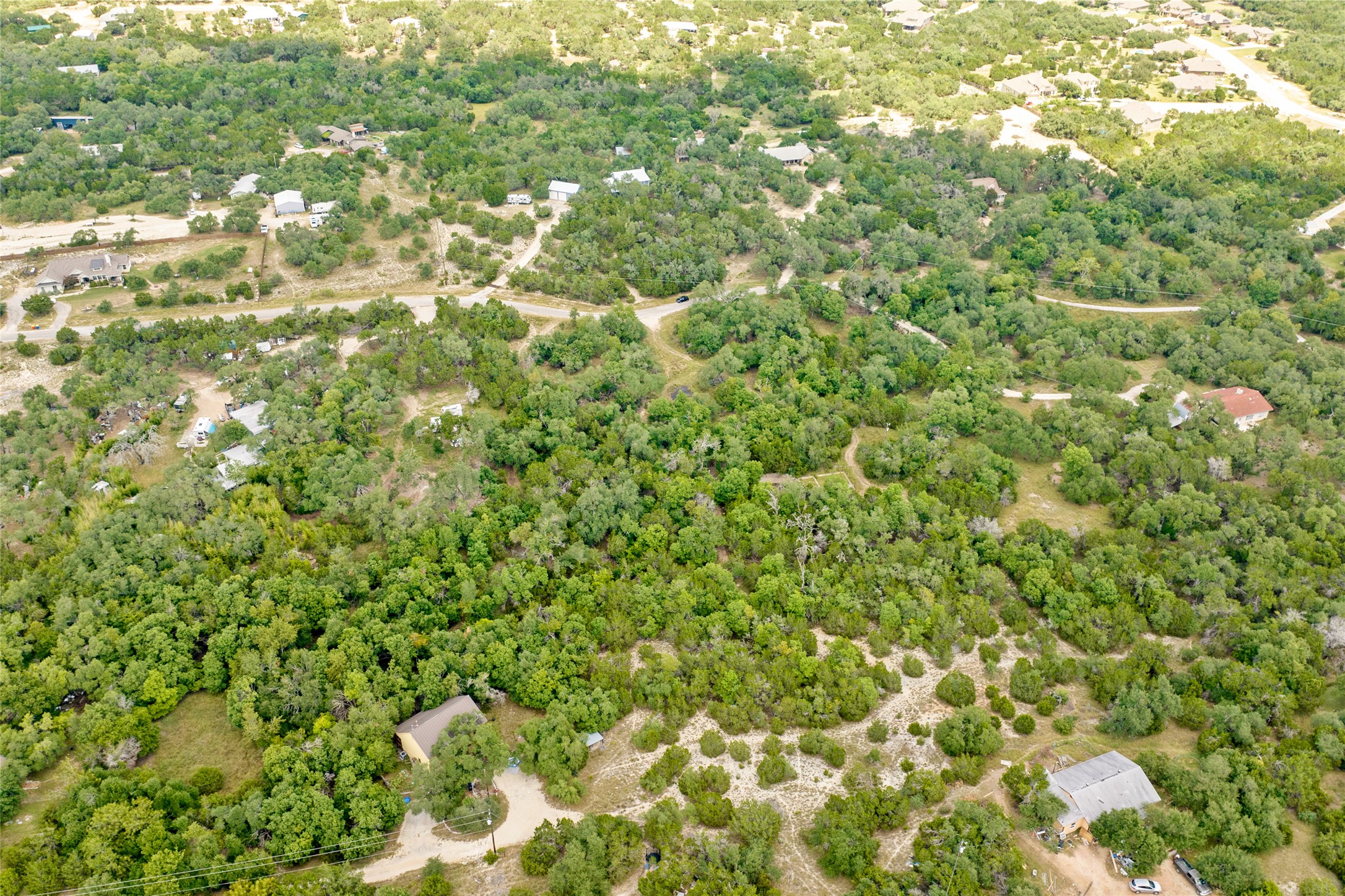 150 Oak Grove Drive Dripping Springs, TX 78620 - Photo 21 of 33 a view of a lush green forest