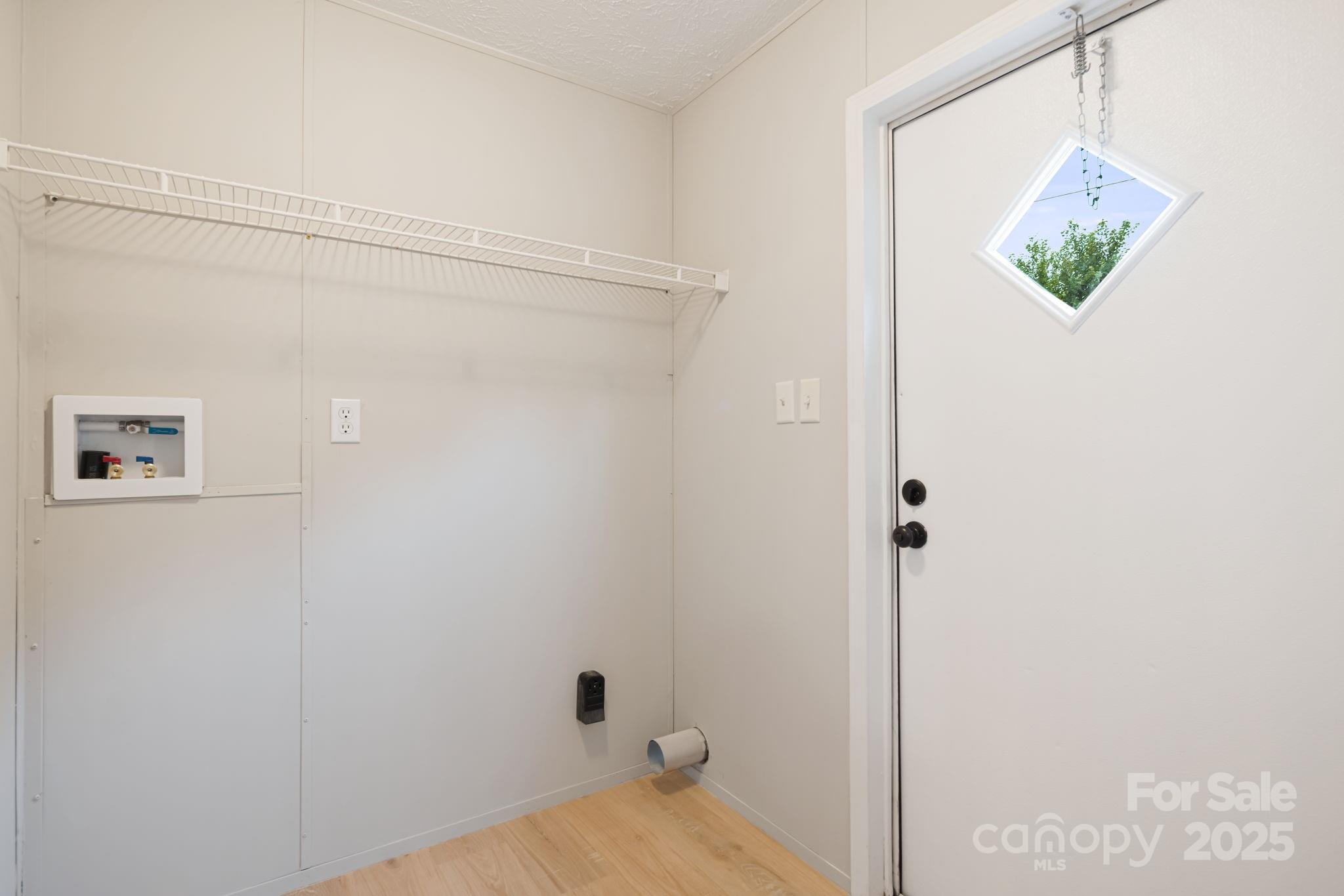 21 Toms Road Candler, NC 28715 - Photo 13 of 29 a view of a bathroom with a shower