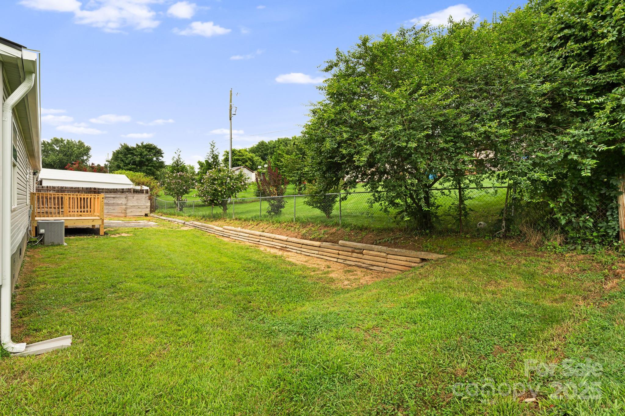 21 Toms Road Candler, NC 28715 - Photo 27 of 29 a view of a house with a big yard