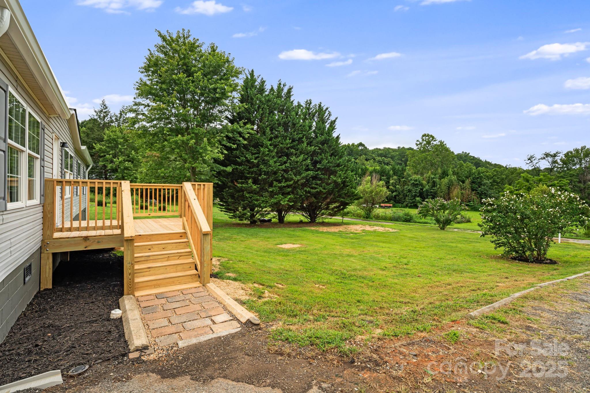 21 Toms Road Candler, NC 28715 - Photo 3 of 29 a view of a patio with a yard