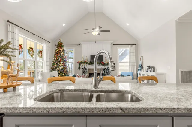 a view of walk in closet with clothes