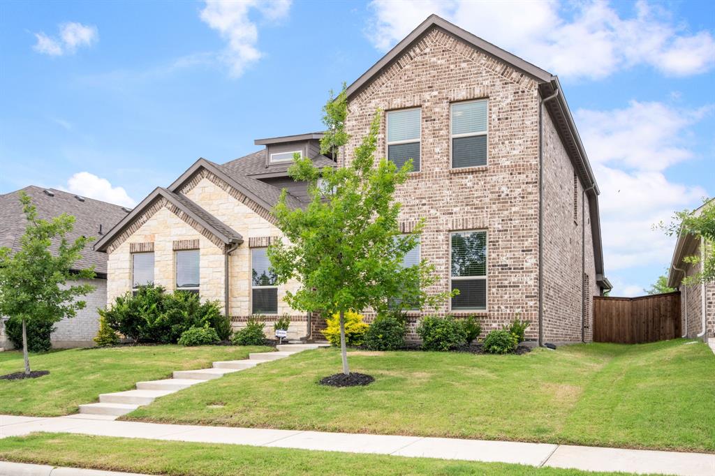 321 Pasture Drive Midlothian, TX 76065 - Photo 34 of 40 a front view of a house with garden