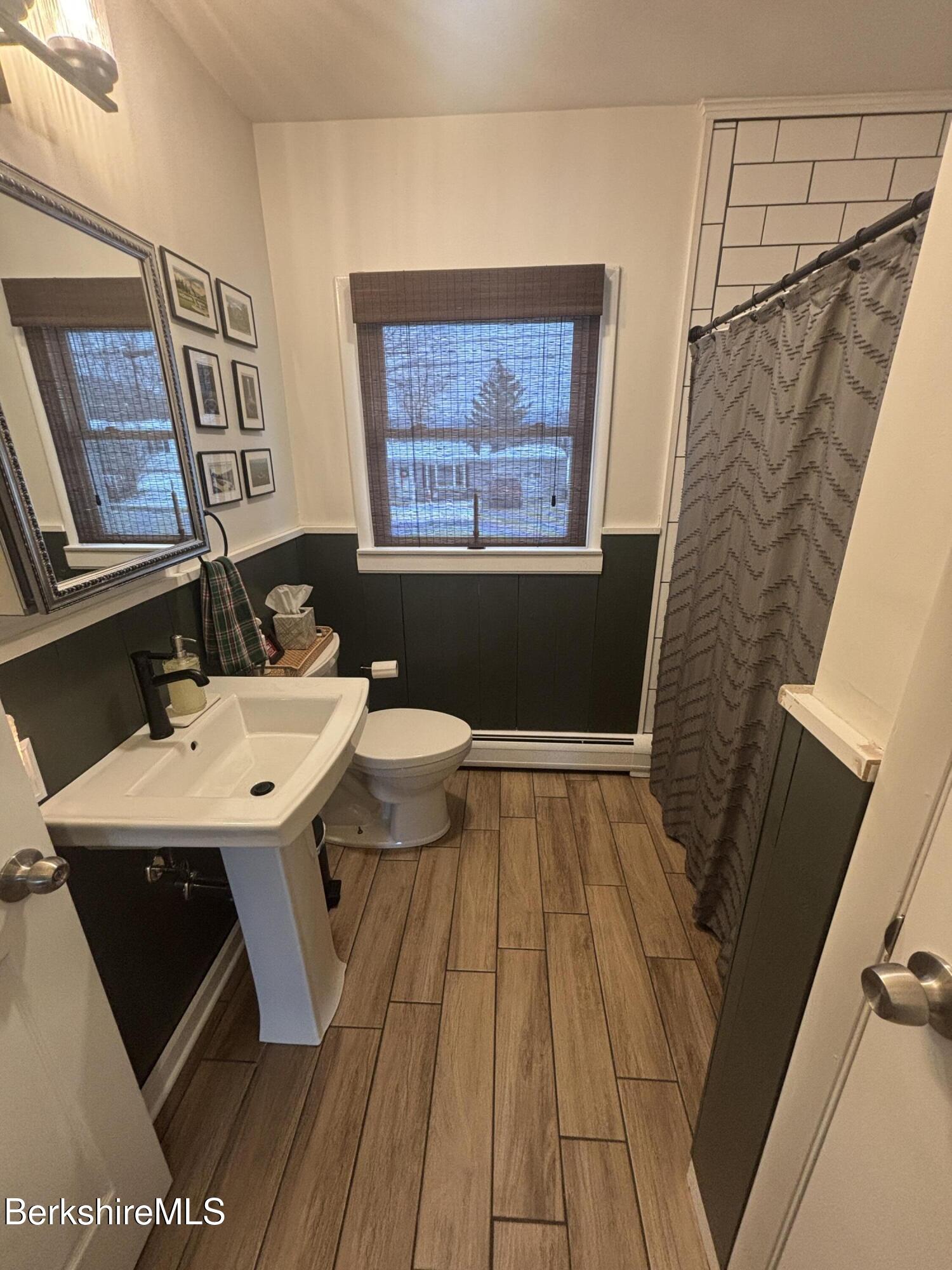 115 Luce Road Williamstown, MA 01267 - Photo 14 of 20 a bathroom with a sink and a mirror