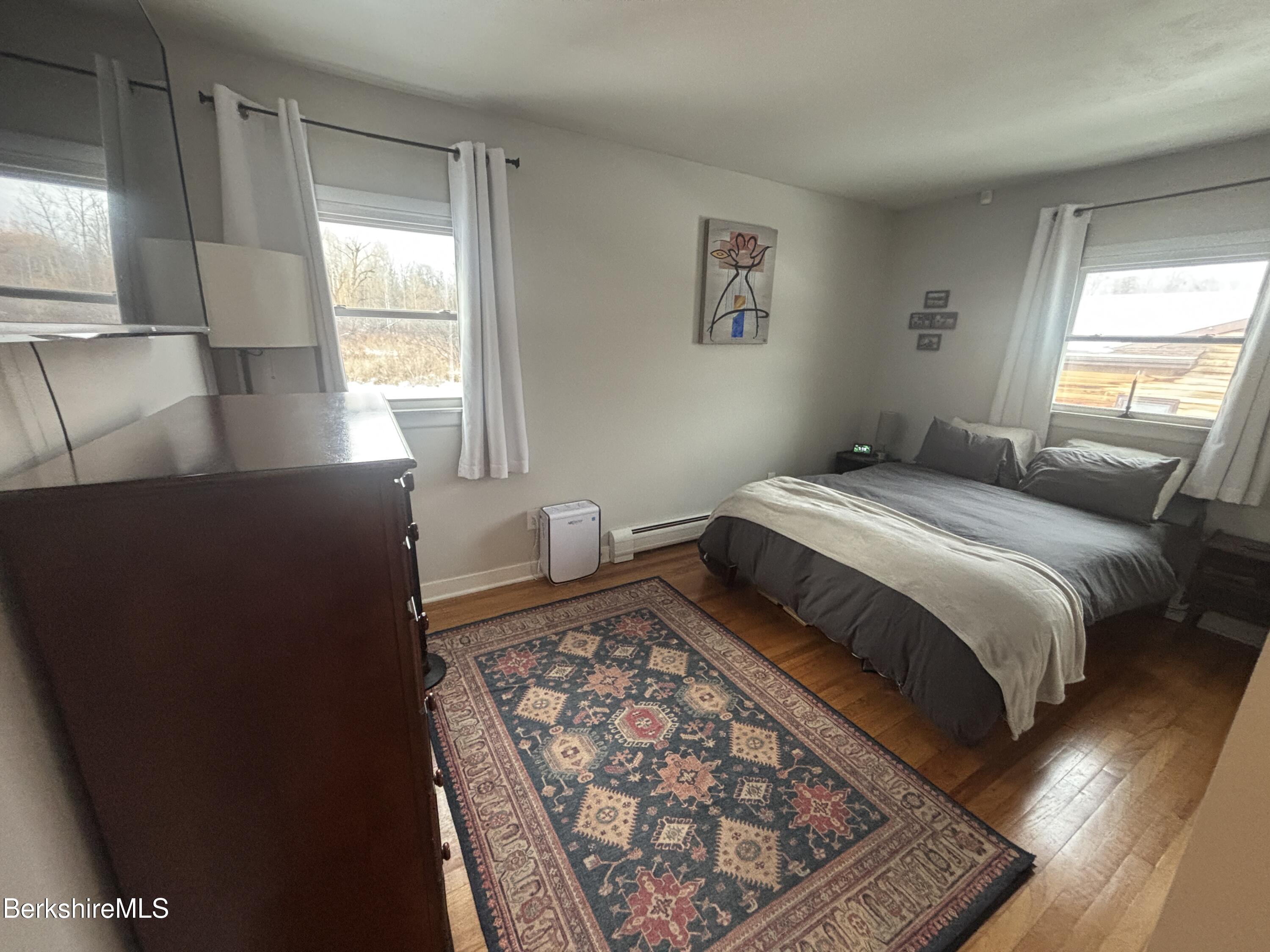 115 Luce Road Williamstown, MA 01267 - Photo 15 of 20 a bedroom with a bed and a window