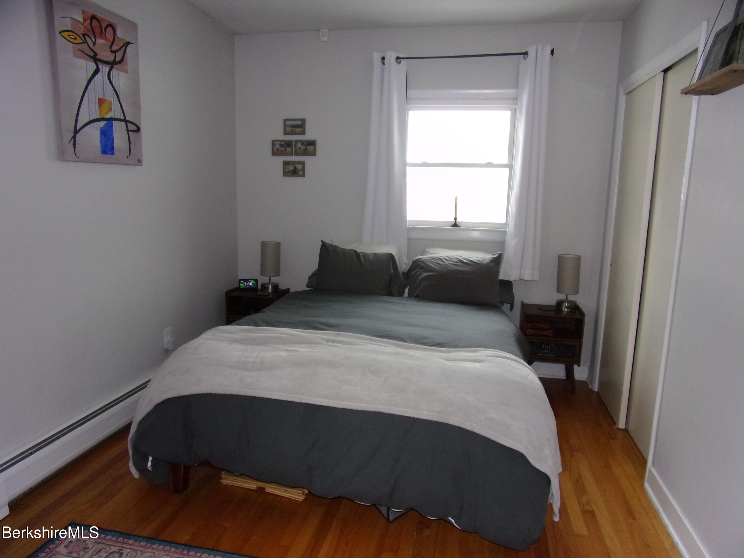 115 Luce Road Williamstown, MA 01267 - Photo 16 of 20 a bedroom with a bed and window