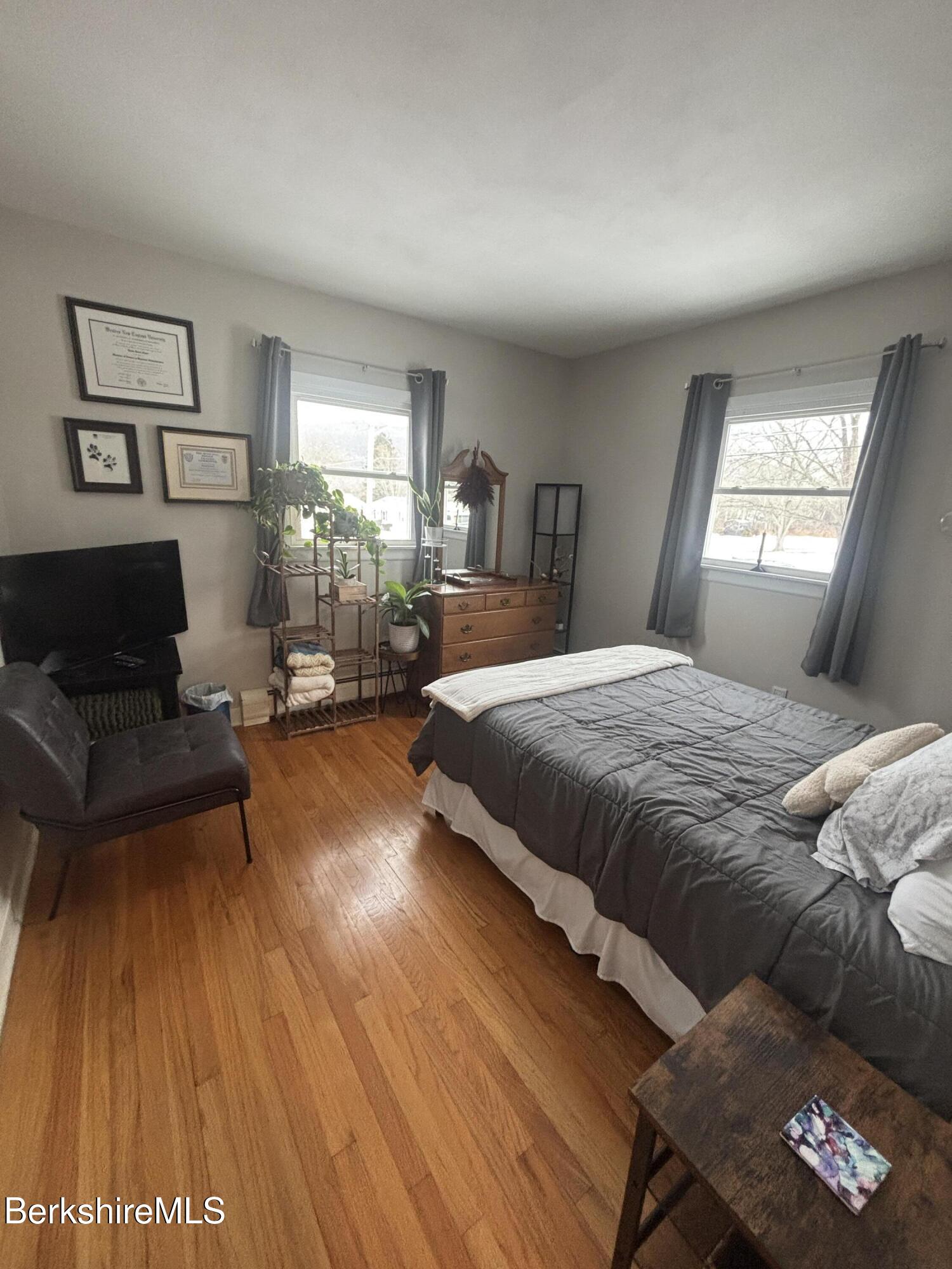 115 Luce Road Williamstown, MA 01267 - Photo 17 of 20 a bedroom with a bed window and couch