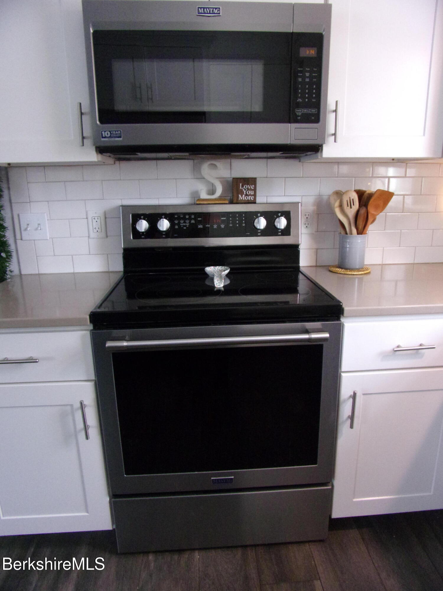 115 Luce Road Williamstown, MA 01267 - Photo 5 of 20 a stove top oven sitting inside of a kitchen