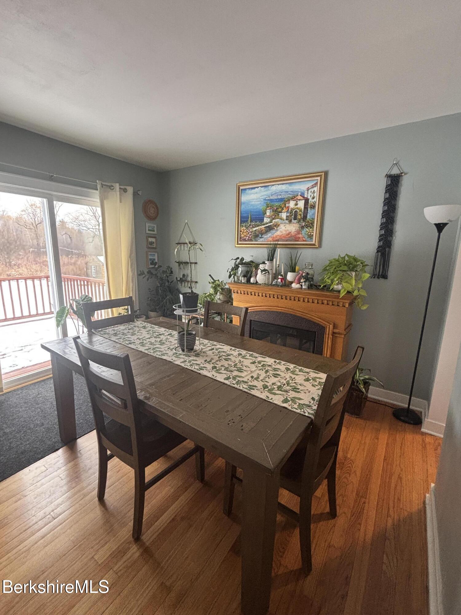 115 Luce Road Williamstown, MA 01267 - Photo 10 of 20 a view of a dining room with furniture and wooden floor