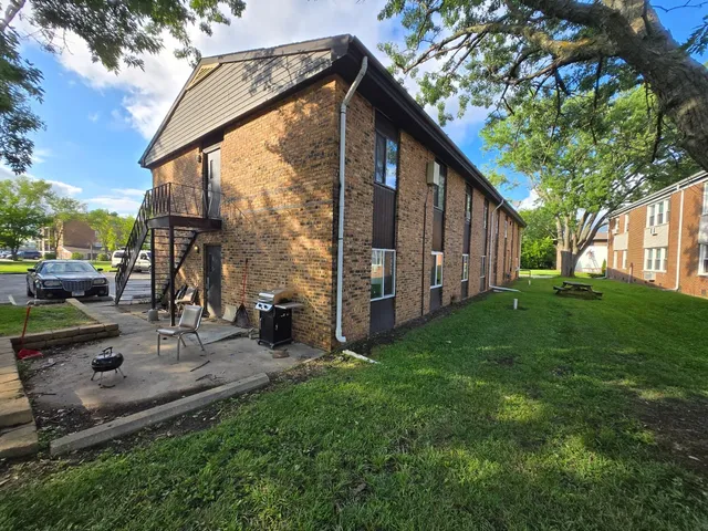 a view of a house with a patio