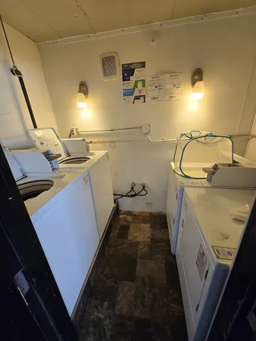 a view of front door of house with an outdoor space