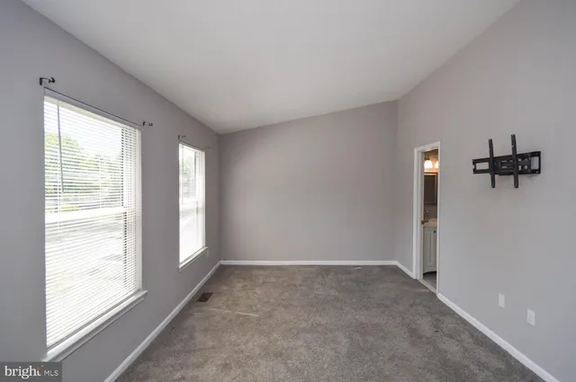 a view of a room with a window