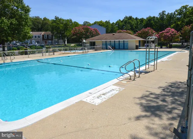a view of a house with a swimming pool