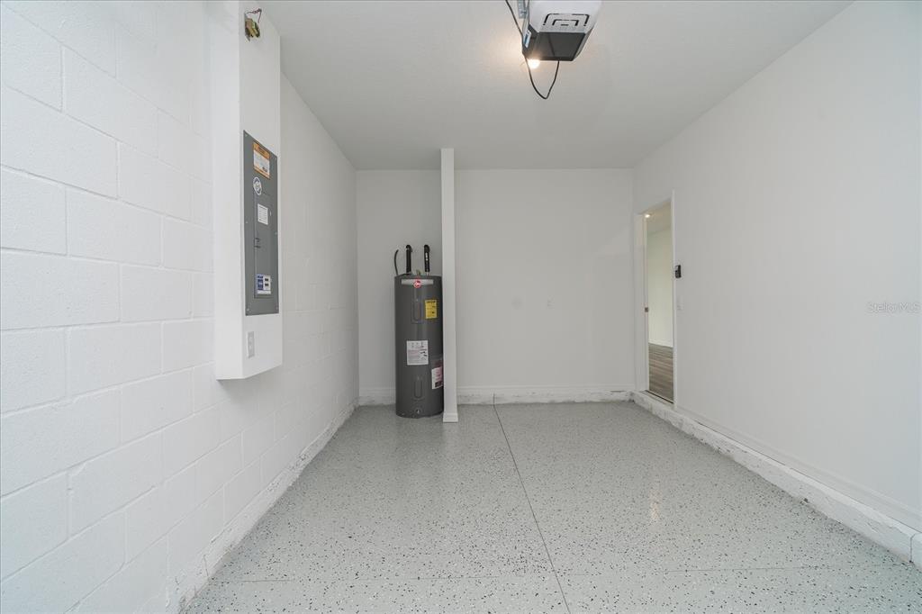 2466 Riversong Ldg Lane Wesley Chapel, FL 33543 - Photo 21 of 33 an empty room with an entryway