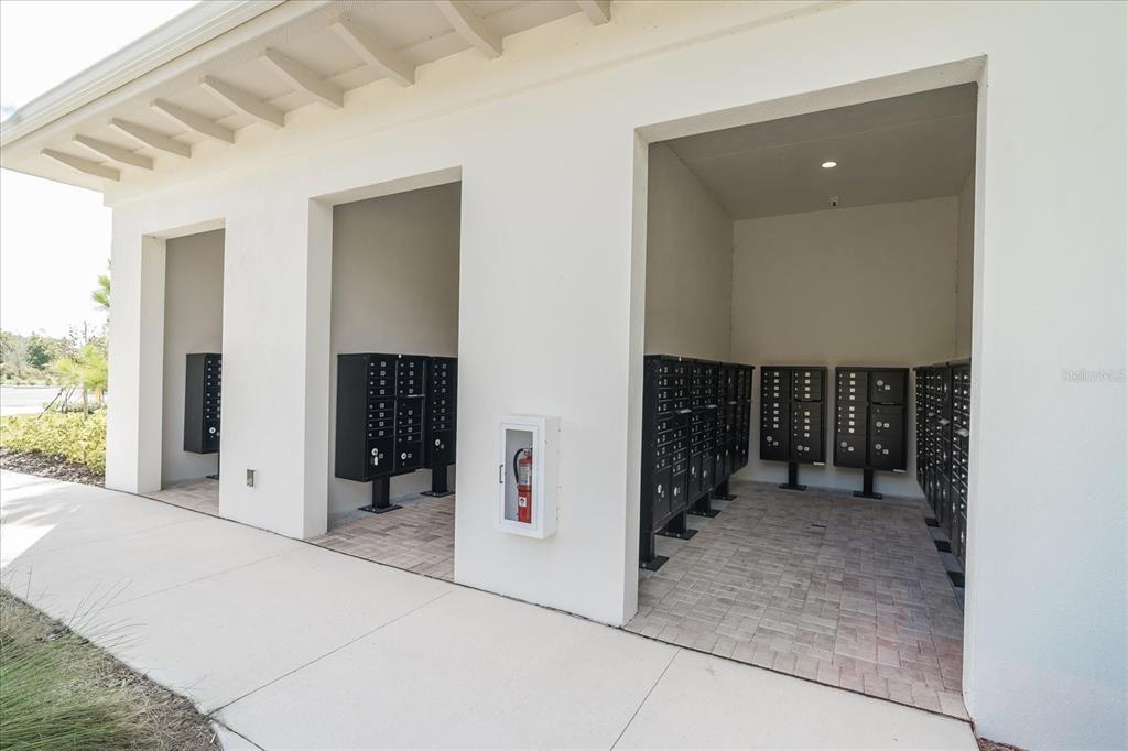 2466 Riversong Ldg Lane Wesley Chapel, FL 33543 - Photo 29 of 33 a view of a hallway with some storage and utility room