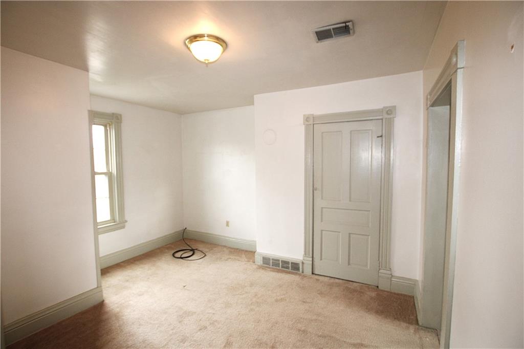 259 Mercer Street Harmony, PA 16037 - Photo 16 of 19 an empty room with windows