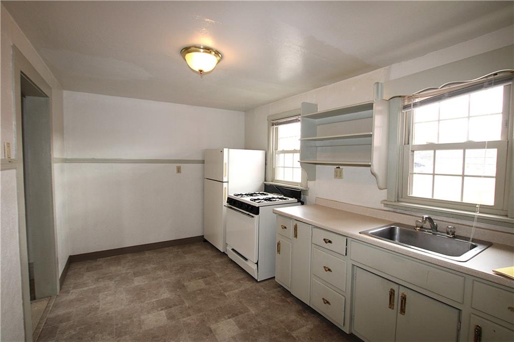259 Mercer Street Harmony, PA 16037 - Photo 17 of 19 a kitchen with appliances cabinets and a sink