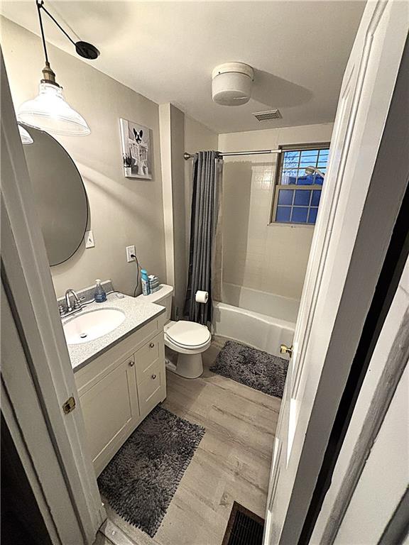 259 Mercer Street Harmony, PA 16037 - Photo 10 of 19 a bathroom with a sink a toilet a mirror and shower