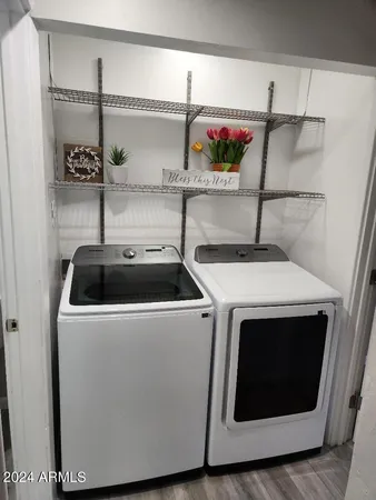 a utility room with dryer and washer